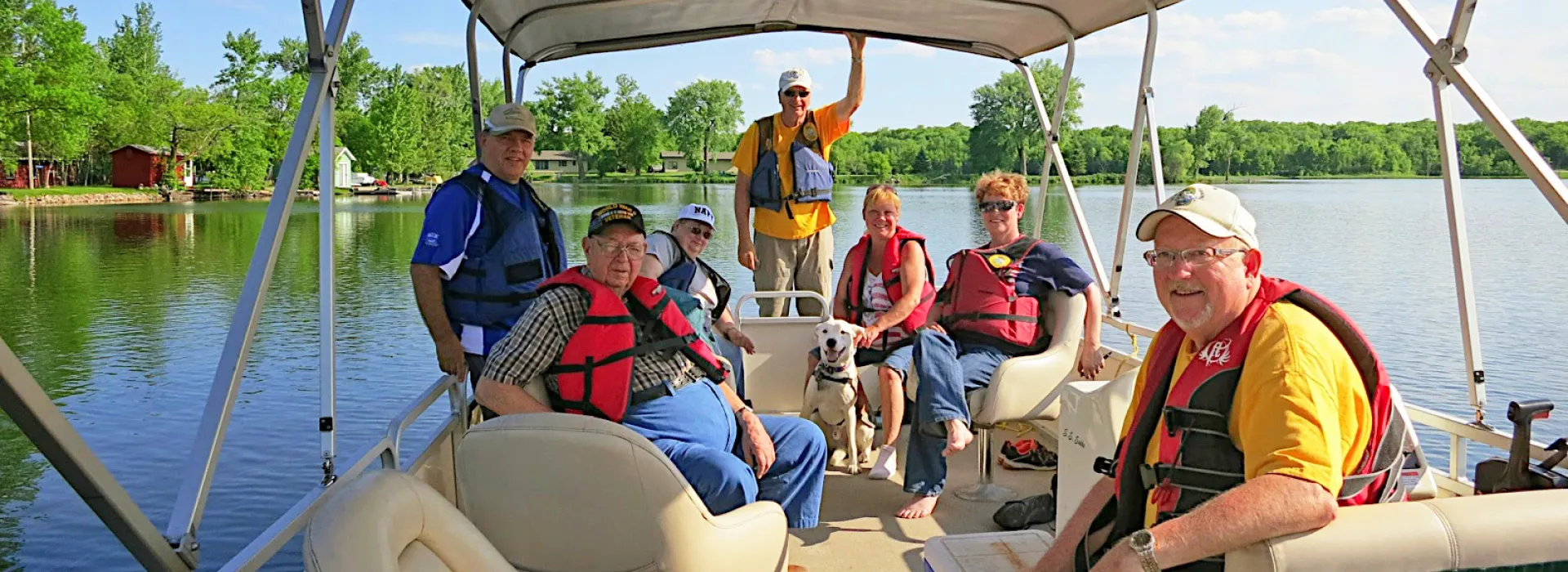 A group fishes at the YMCA Veteran's Fishing Tournament.